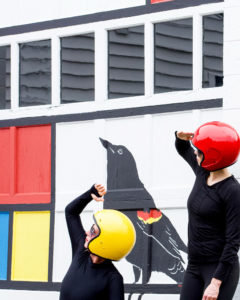 TaMaMa Dance Company performing in front of the Mondrian Garage Mural on Third Street in Marquette MI for Artweek.