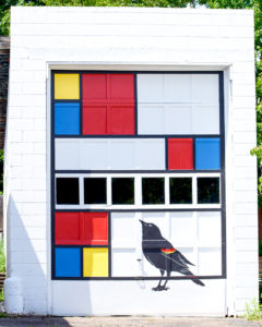 Mondrian Garage Mural by Marquette Artist Taryn Okesson on Third Street in Marquette is Finished and Ready for 2019 Artweek.