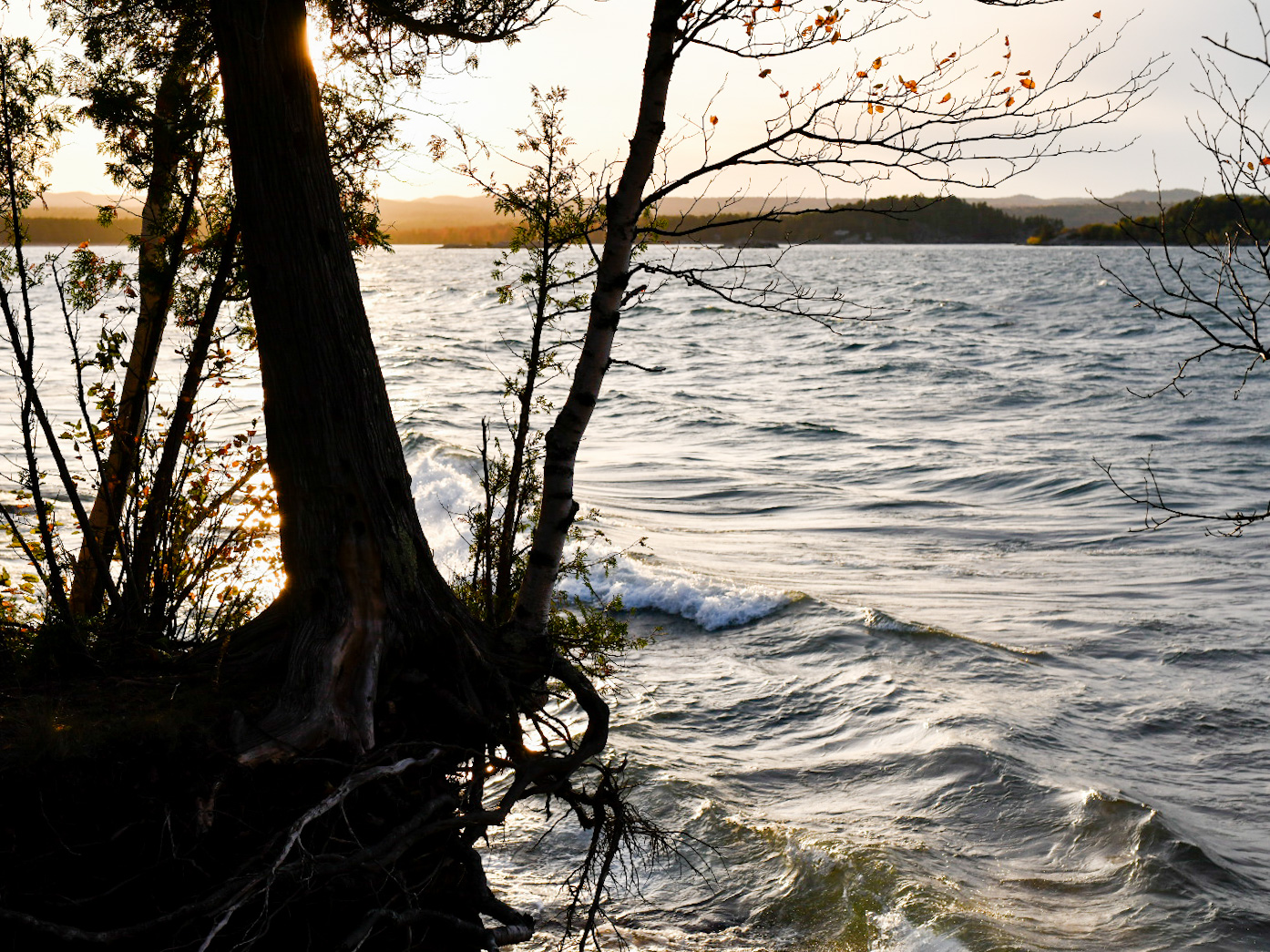 Sunset at Presque Isle, Marquette, MI 49855 by local artist, visual artist, photographer, Taryn Okesson. Autumn in the Upper Peninsula of Michigan on Lake Superior. Fall Colors, Lake Superior Waves.