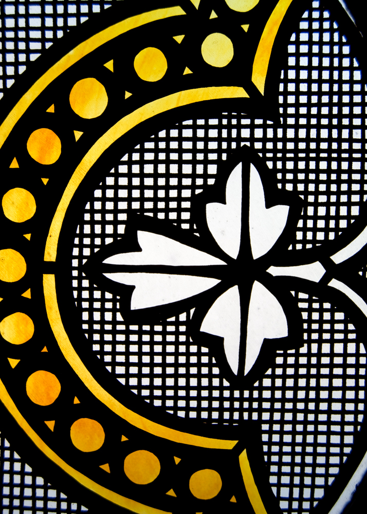Detail of a building window on Mackinac Island by visual artist, Marquette artist, photographer, Taryn Okesson